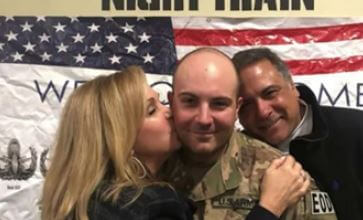 John Perez with his wife Kelley Dunn and son.